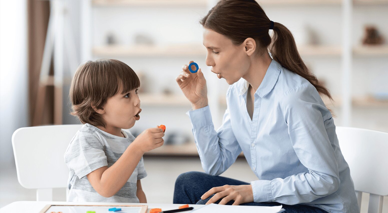 Image of parent and autistic child